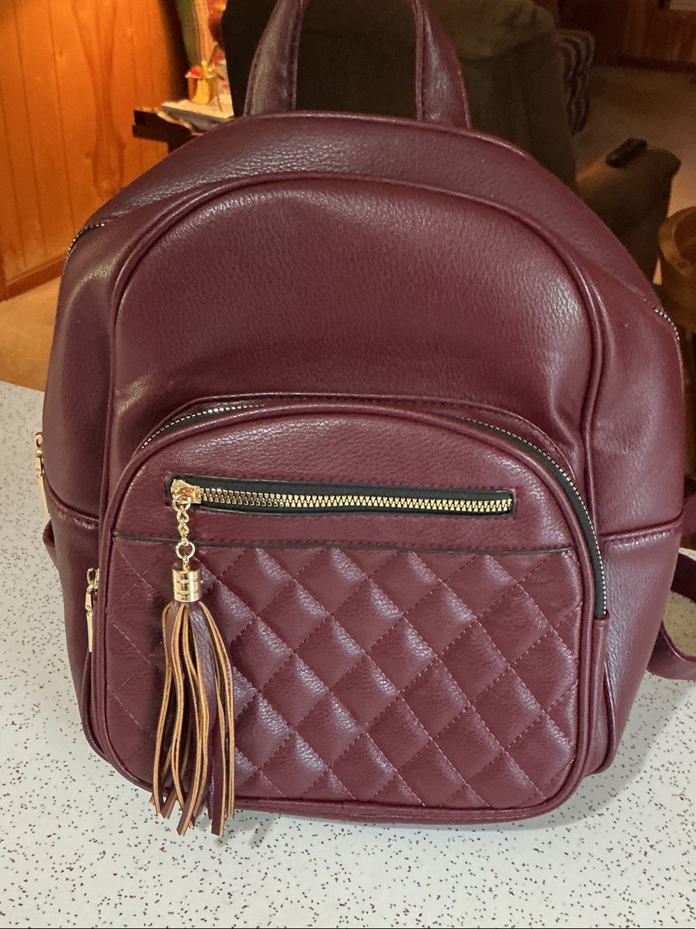 Quilted Burgundy Women's Backpack with Tassel Accent